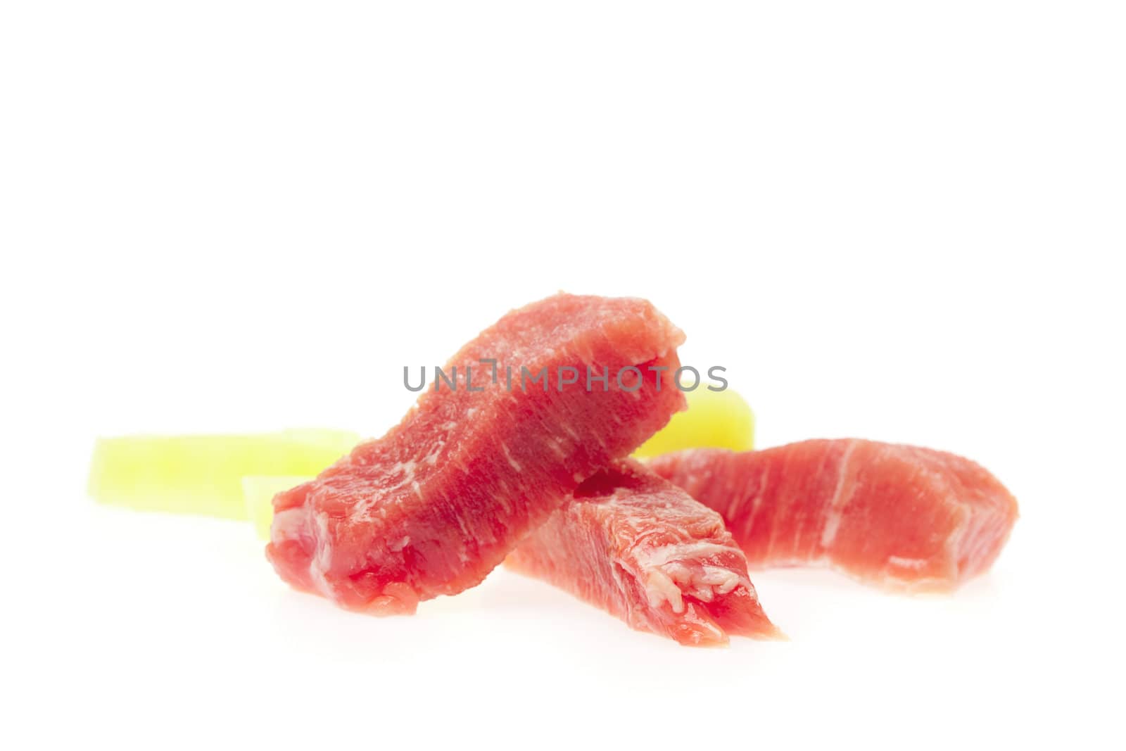 Juicy slices of pork and pepper isolated on white