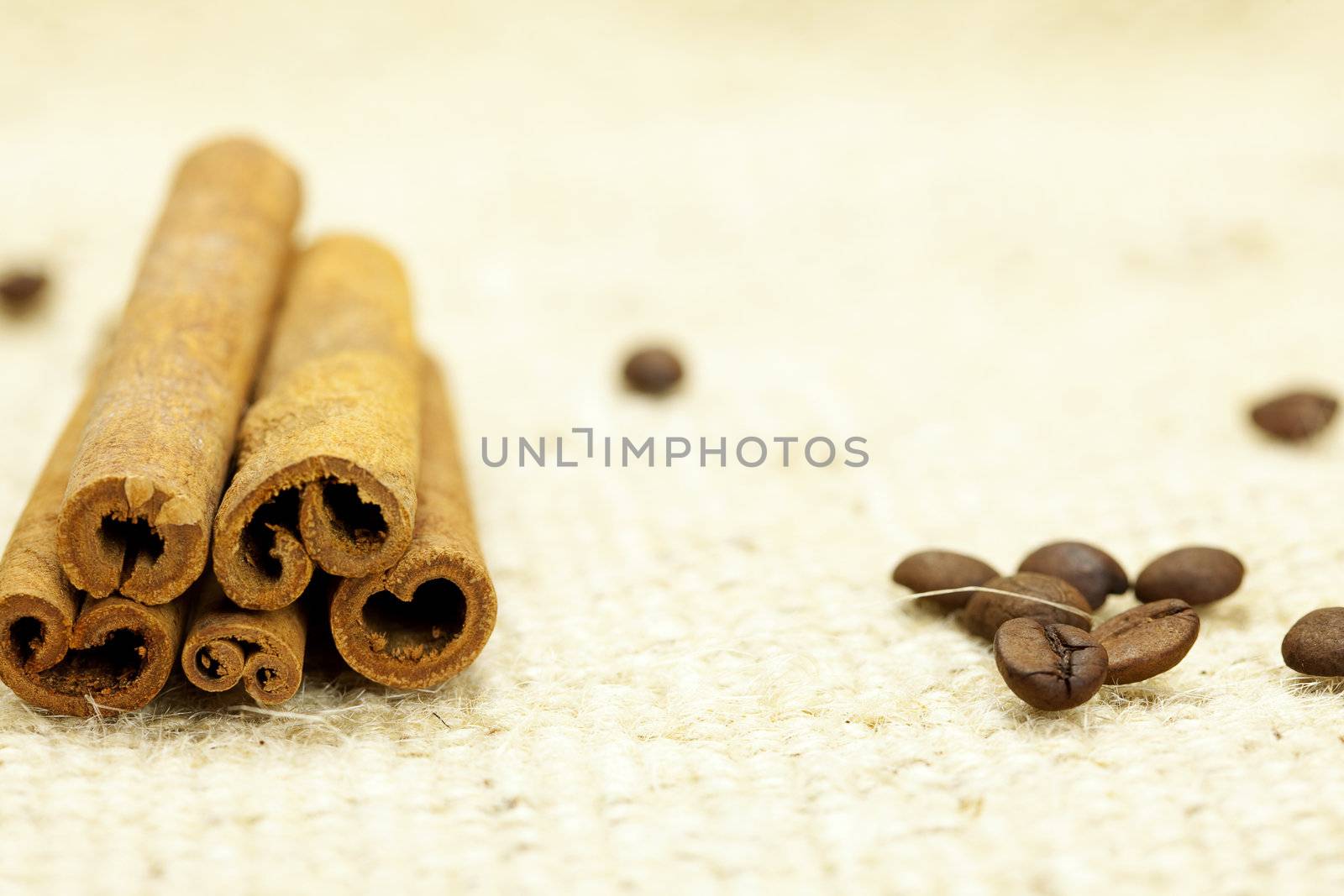 cinnamon  and coffee on a wicker mat