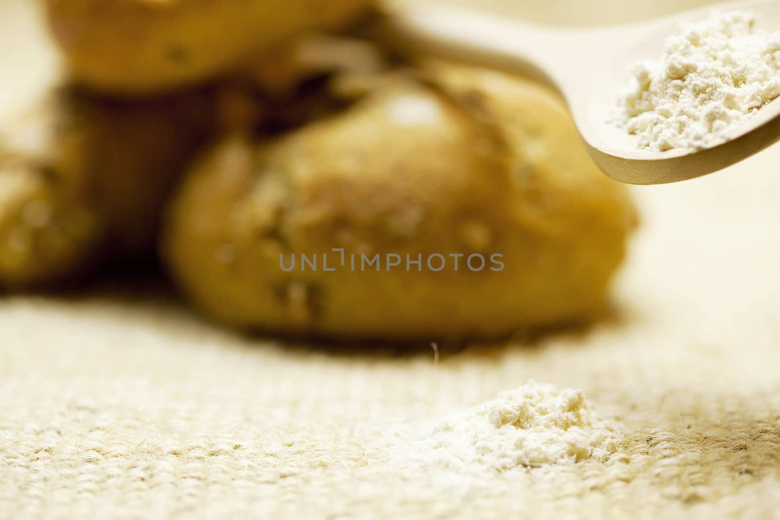 bread and flour   on a wicker mat by jannyjus