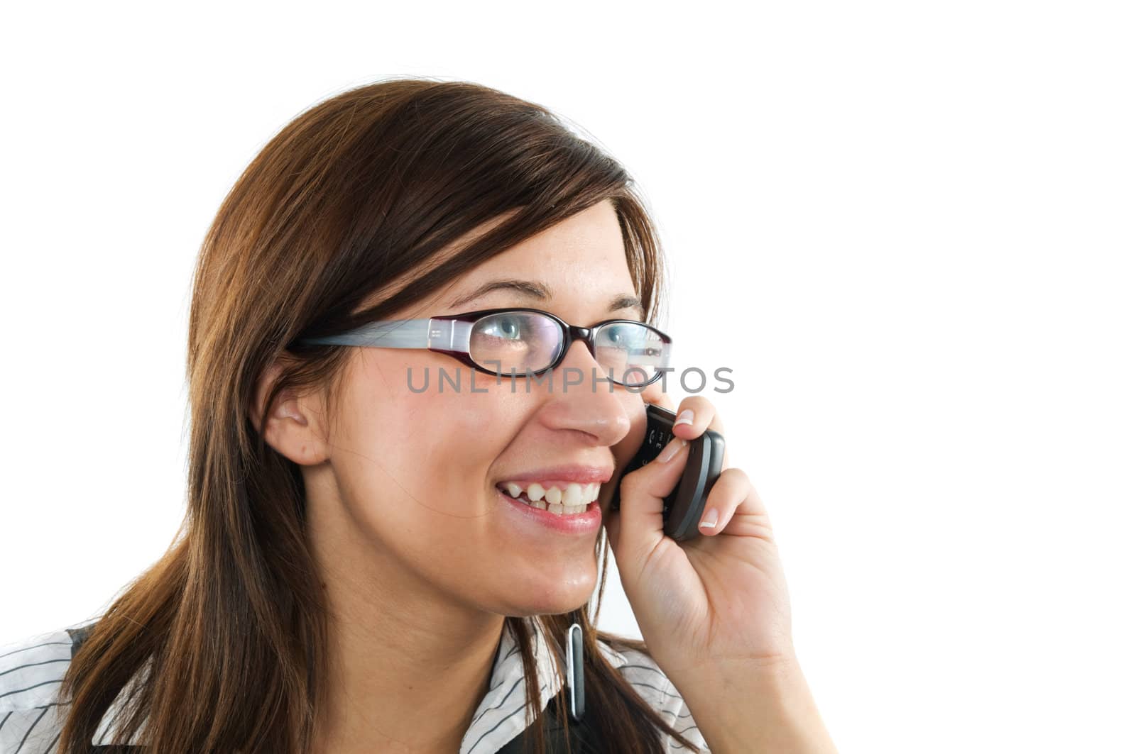 Happy businesswoman having phone conversation. Isolated on white background