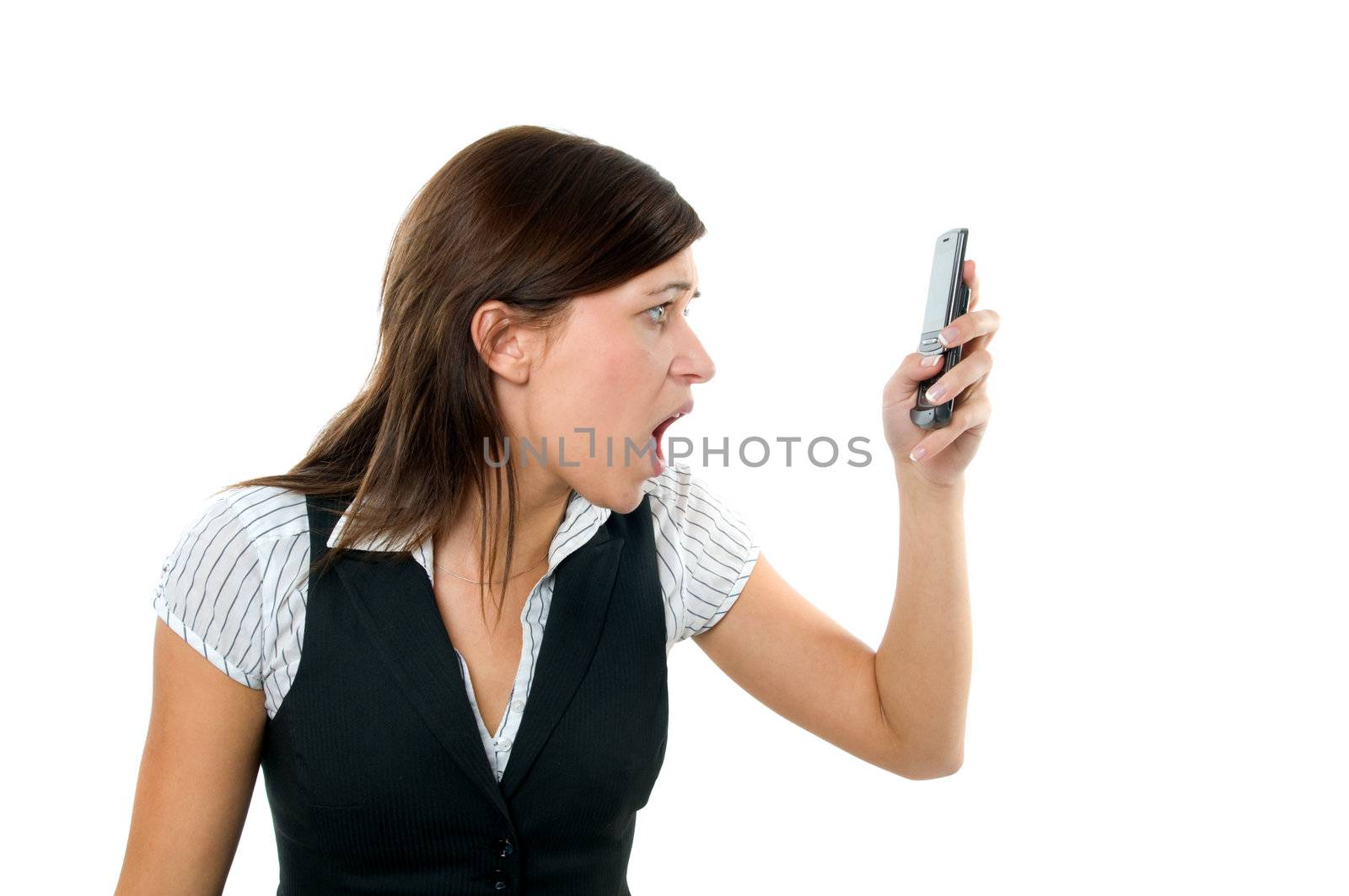 Angry businesswoman shouting to mobile by photocreo