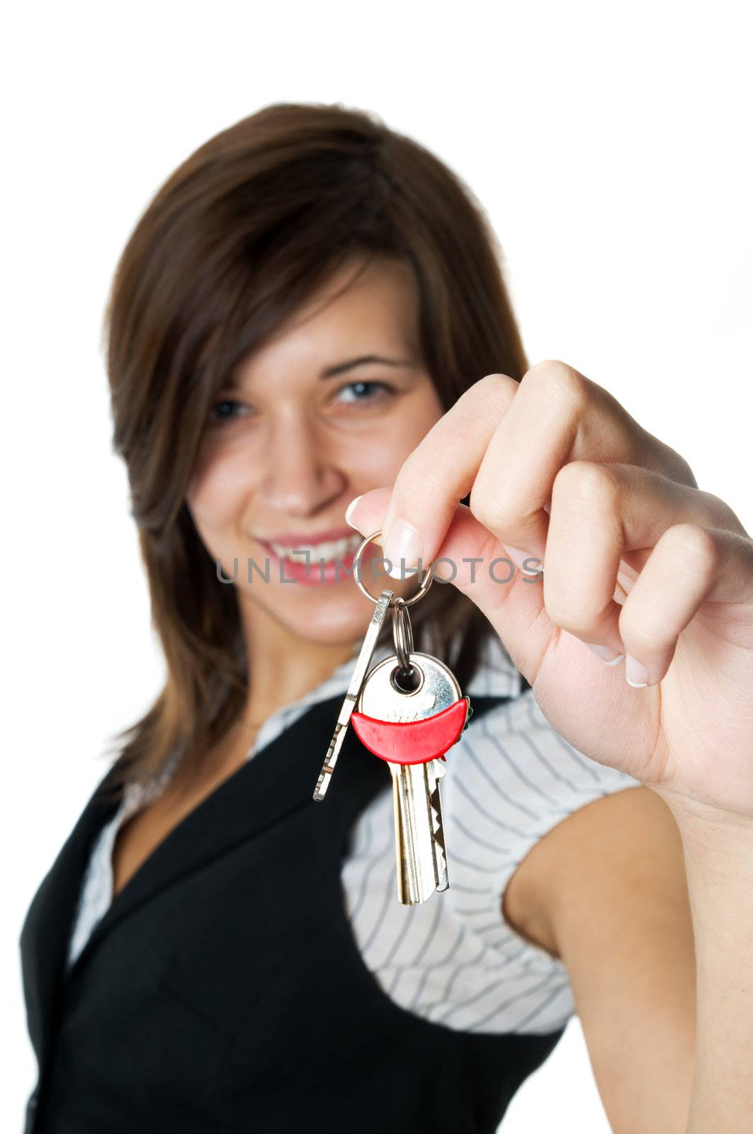 Smiling developer gives keys to new home. Isolated on white background