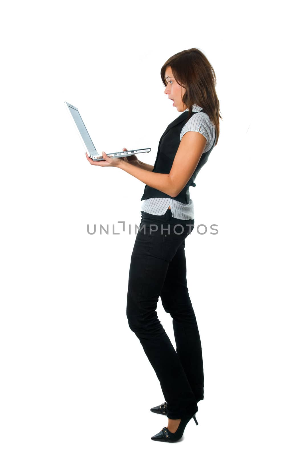 Businesswoman standing surprised with notebook on white background.