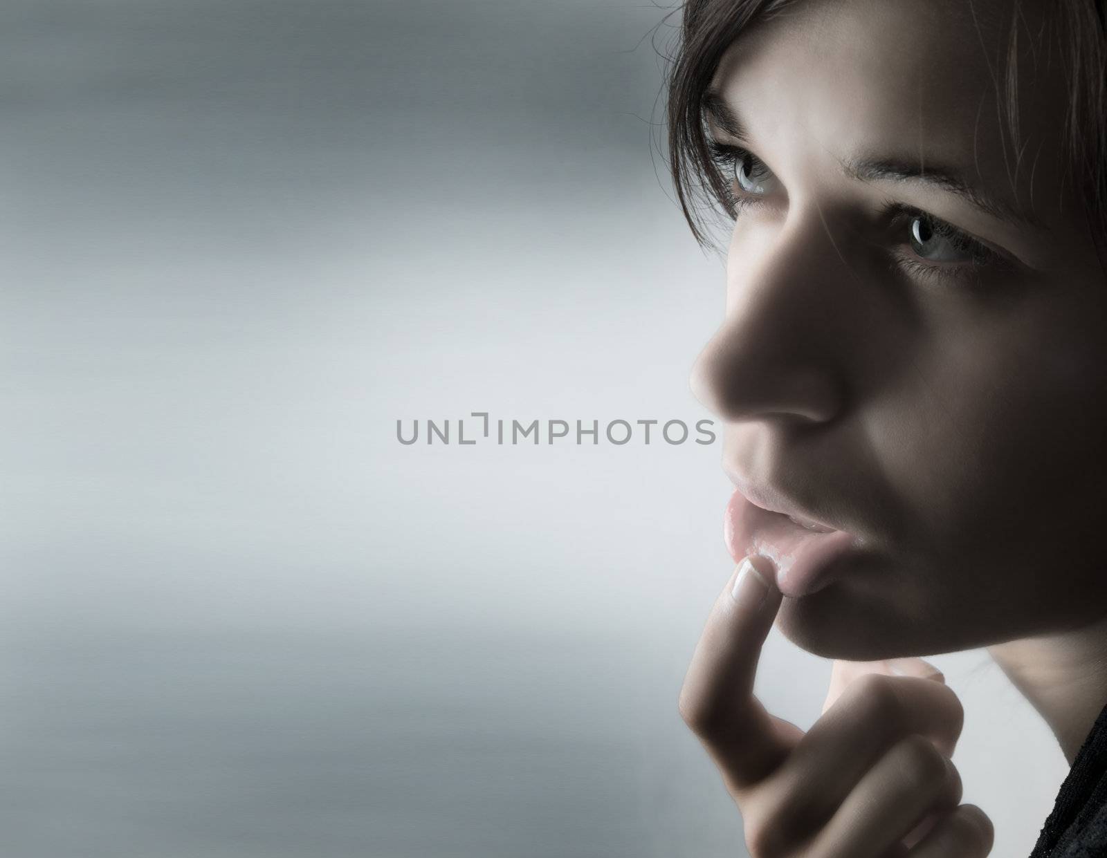 Modern, stylish portrait of young woman by photocreo