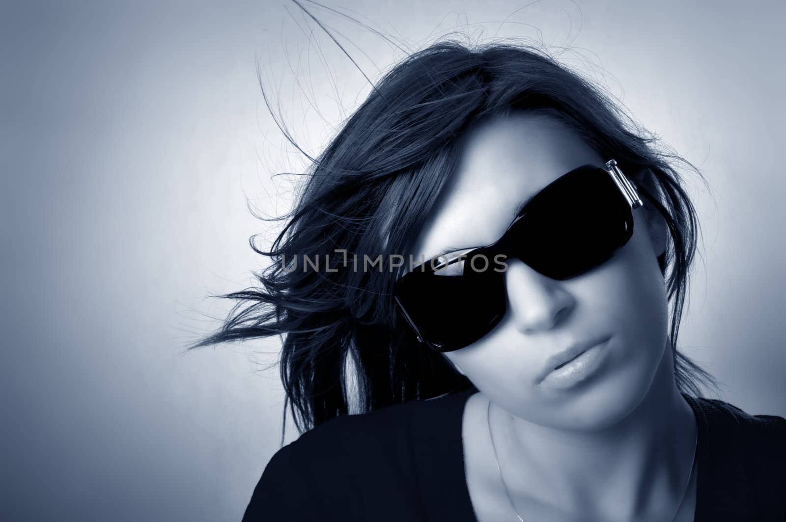 Modern, stylish portrait of young woman by photocreo