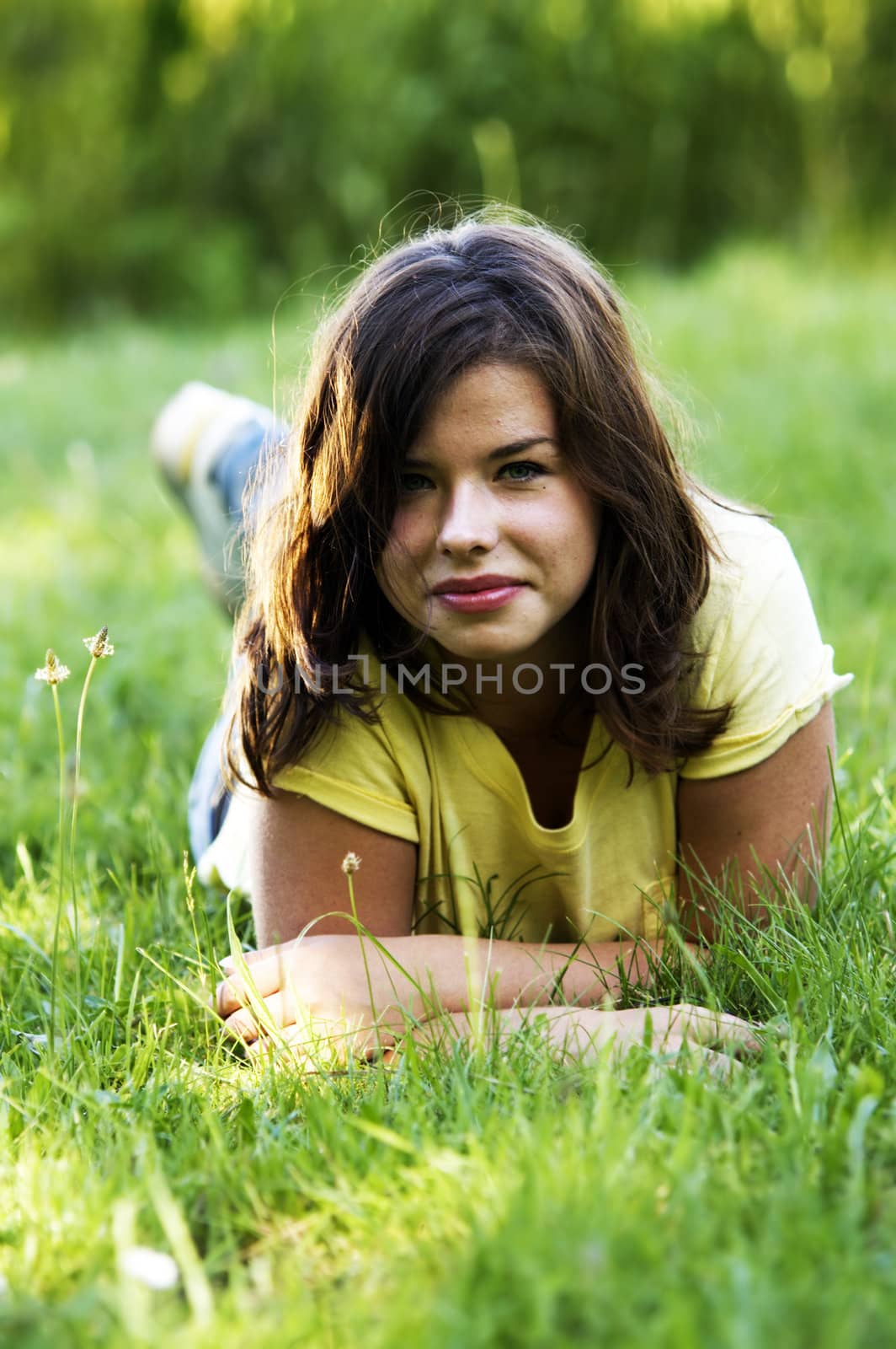 Pretty smiling girl relaxing outdoor