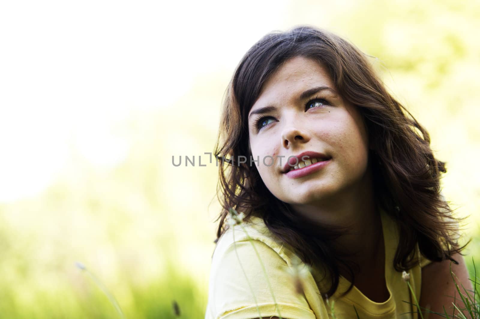 Pretty smiling girl relaxing outdoor