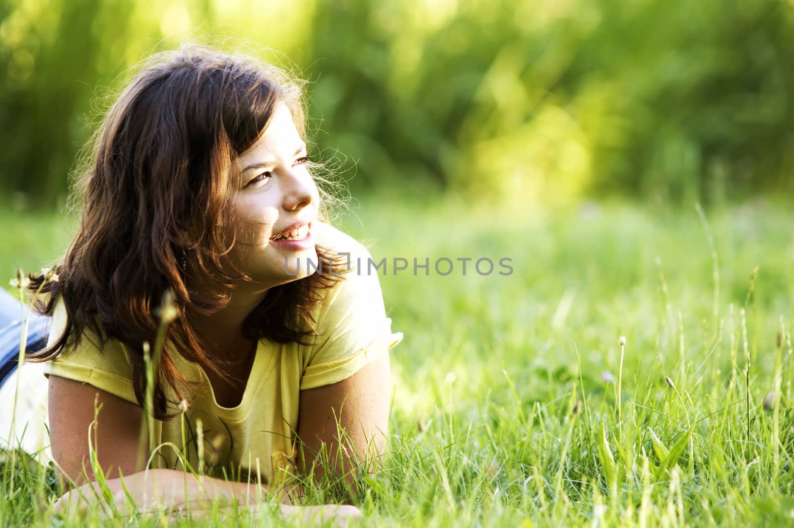 Pretty smiling girl relaxing outdoor