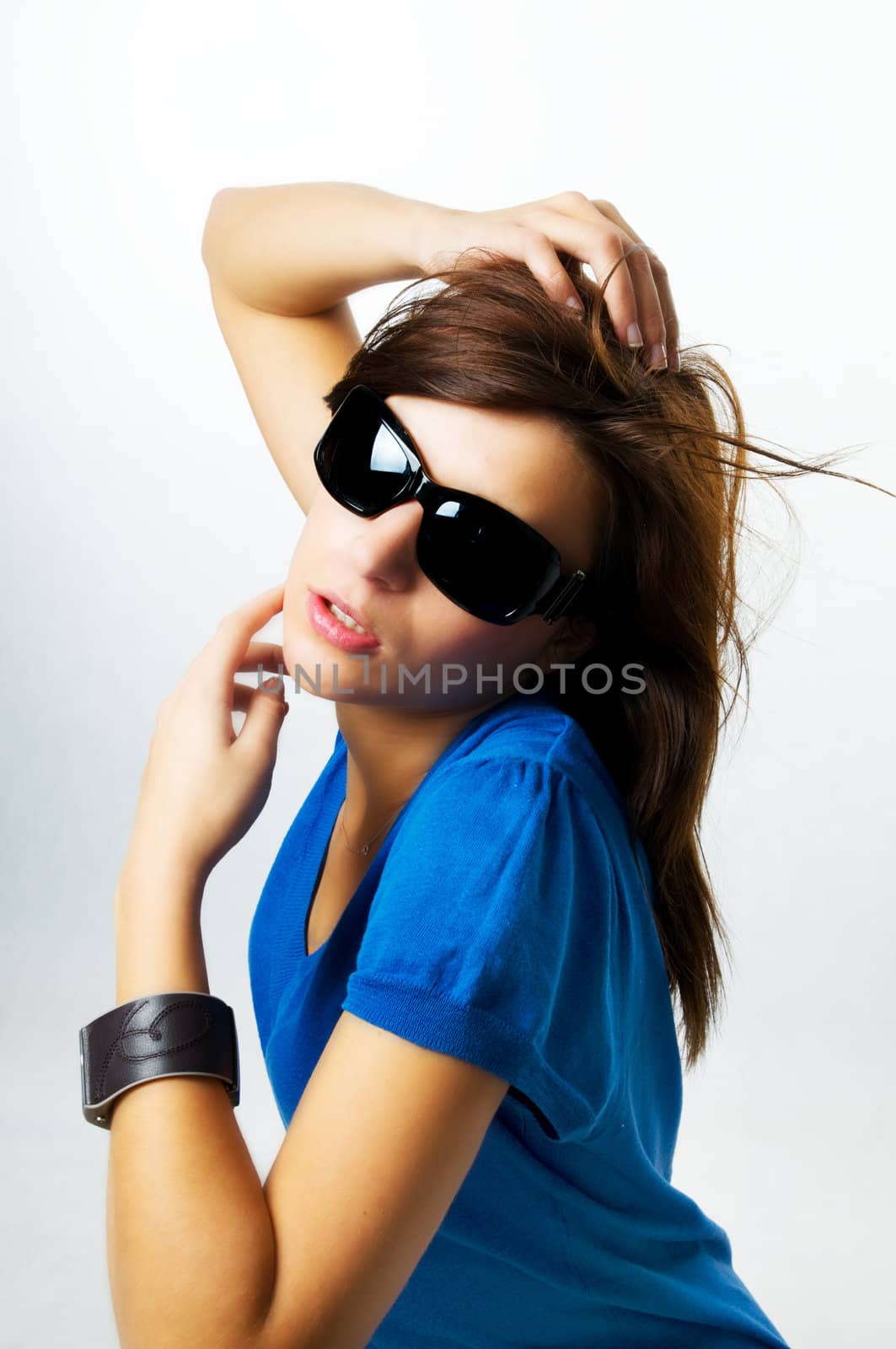 Modern, stylish portrait of young woman by photocreo