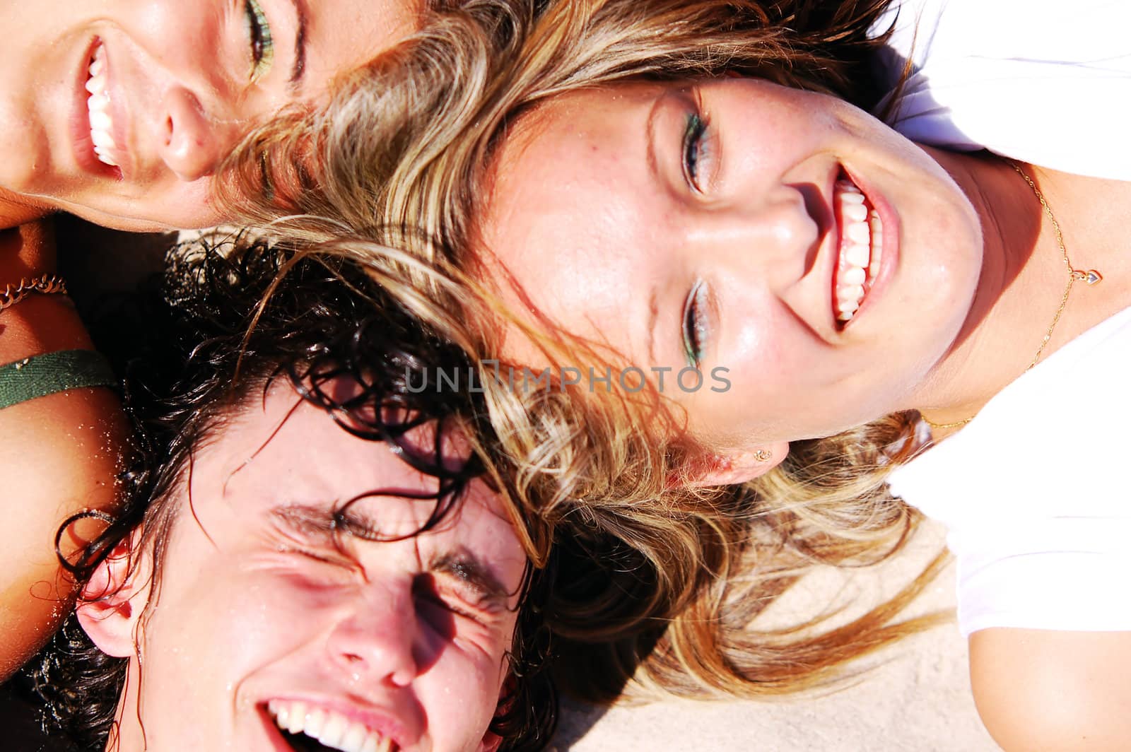 Young attractive friends enjoying the summertime and company of each other. 