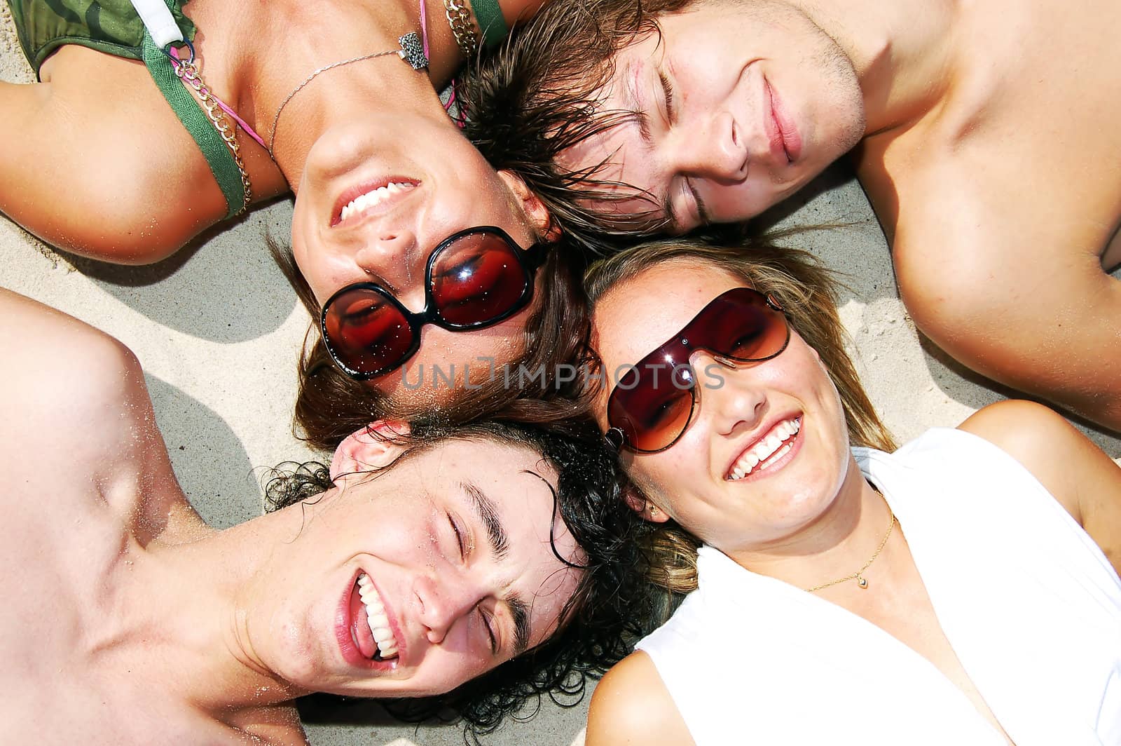 Young attractive friends enjoying the summertime and company of each other. 