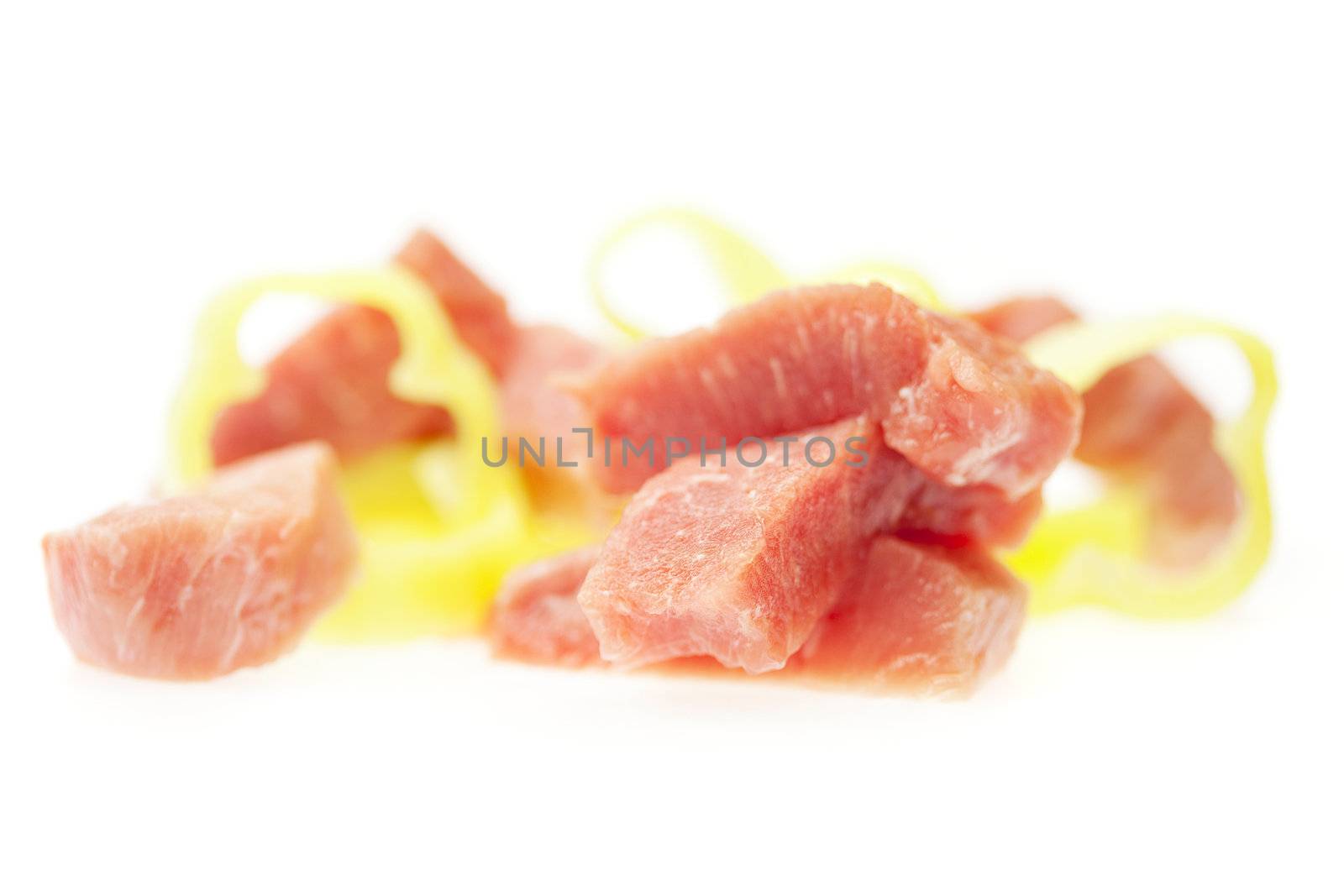 chunks of fresh meat and pepper isolated on white by jannyjus