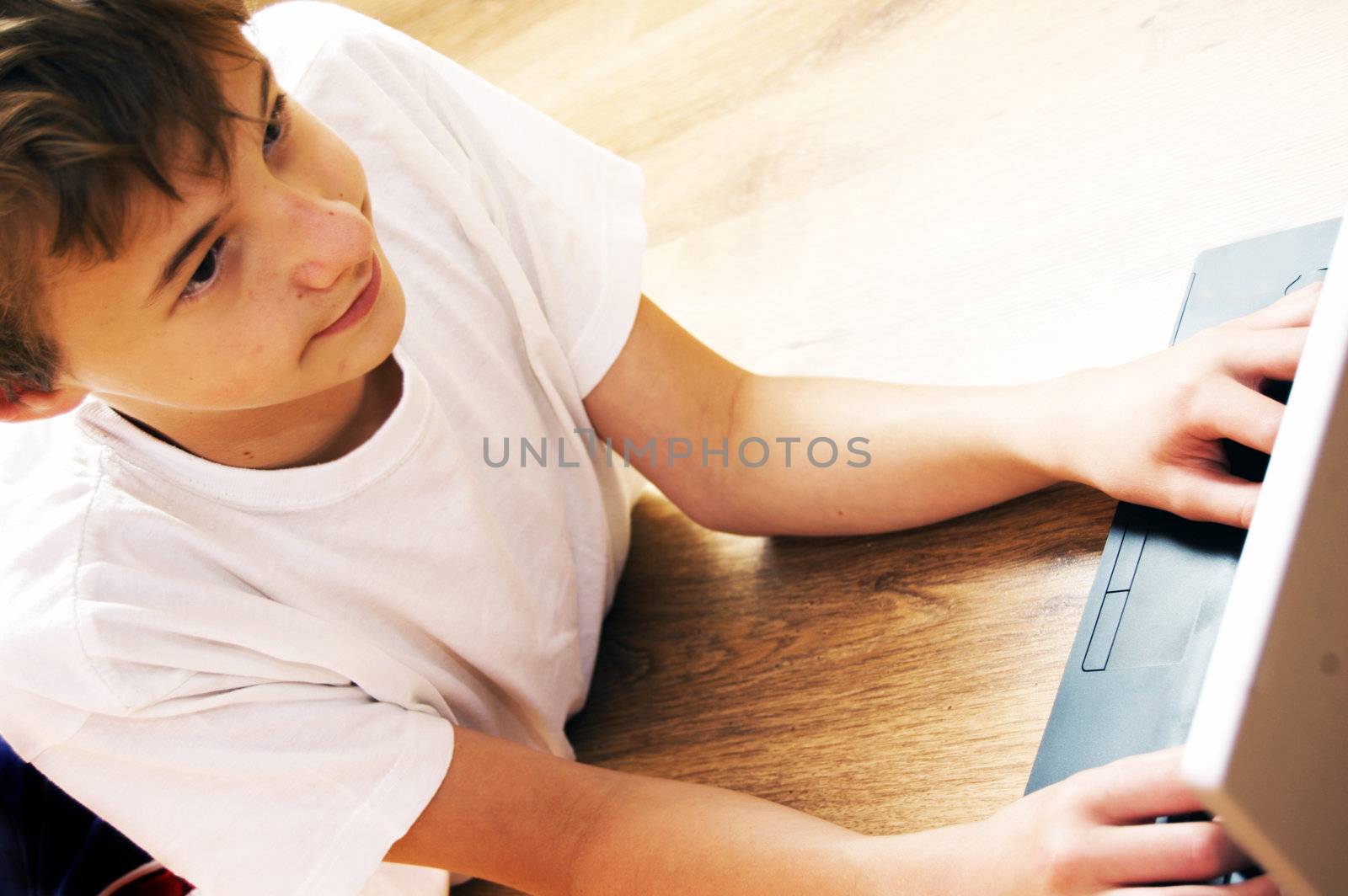 Boy with notebook by photocreo