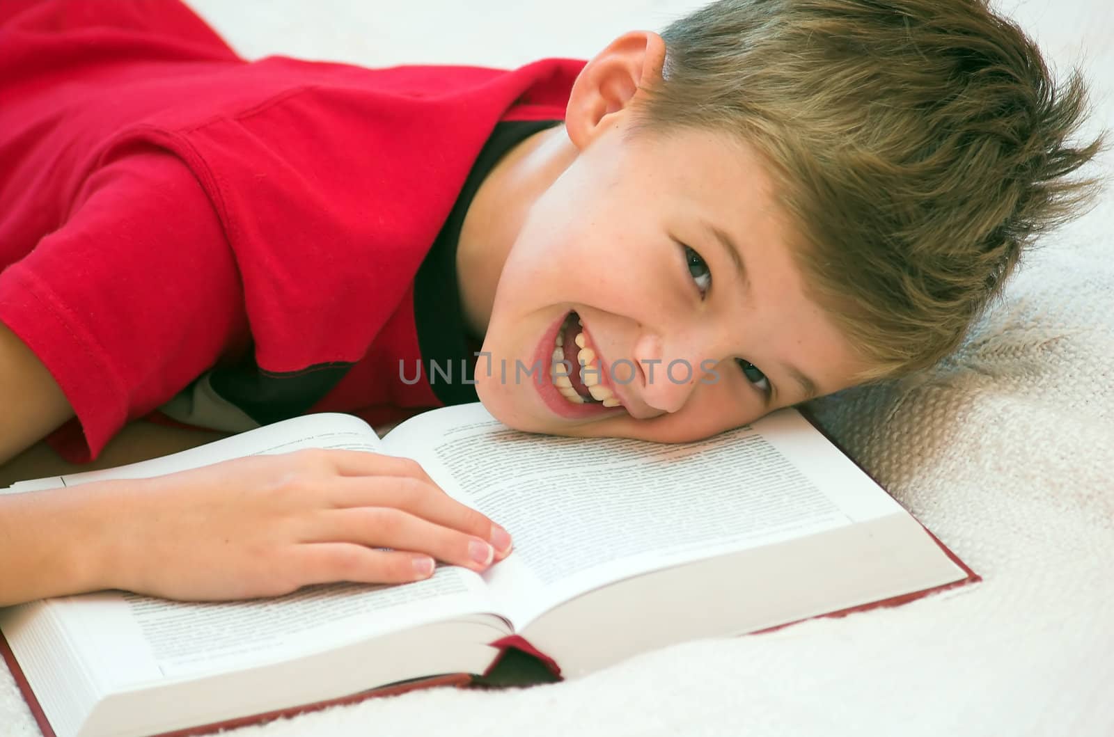 Schoolboy having fun during studying