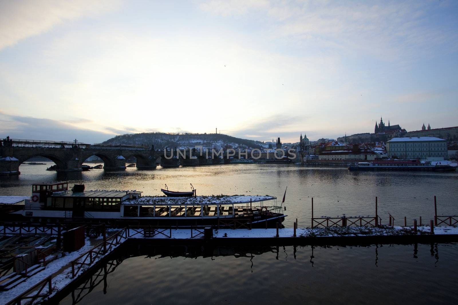 sunset at the river near the bridge in Prague