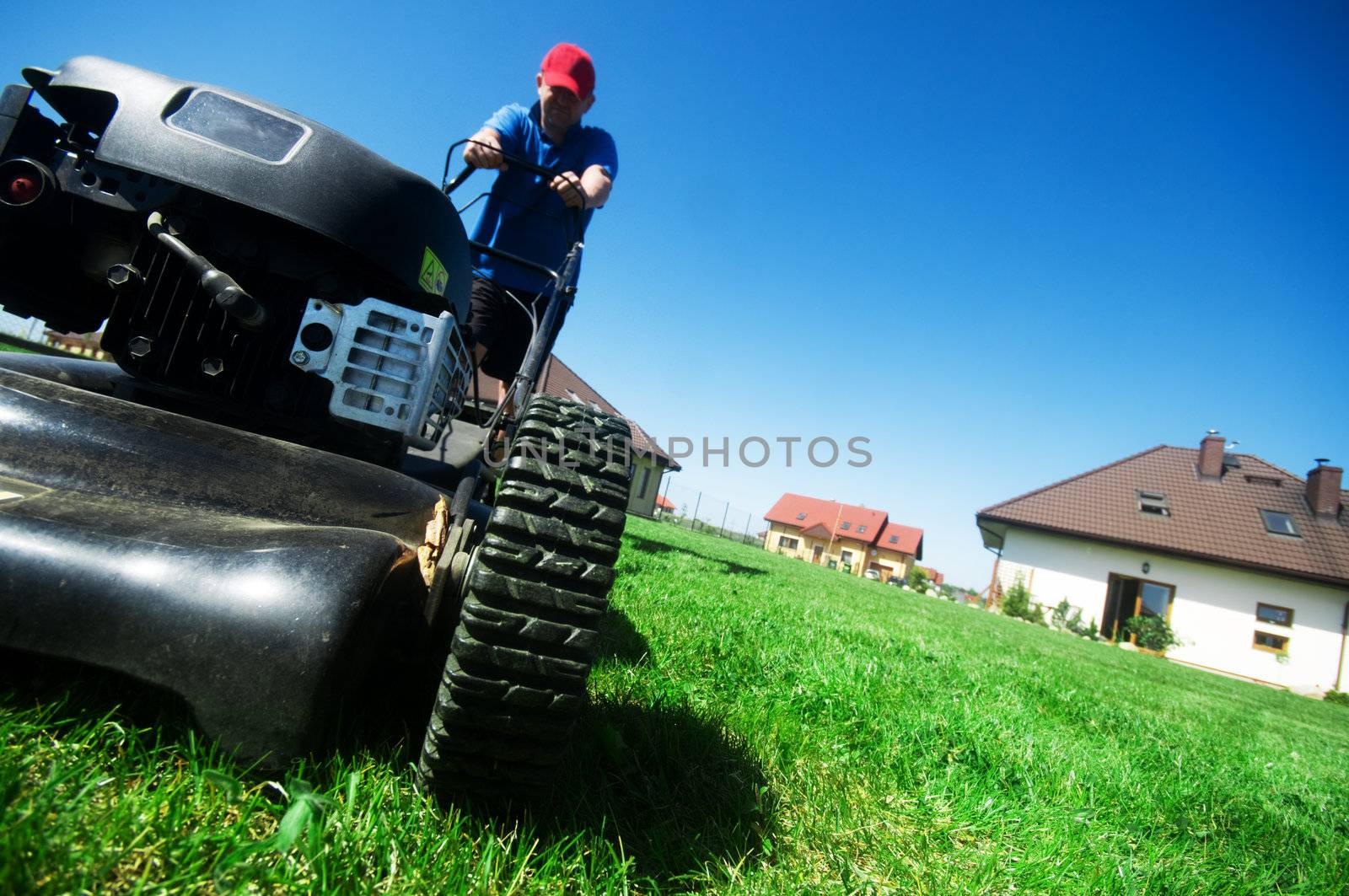 Mowing the lawn by photocreo
