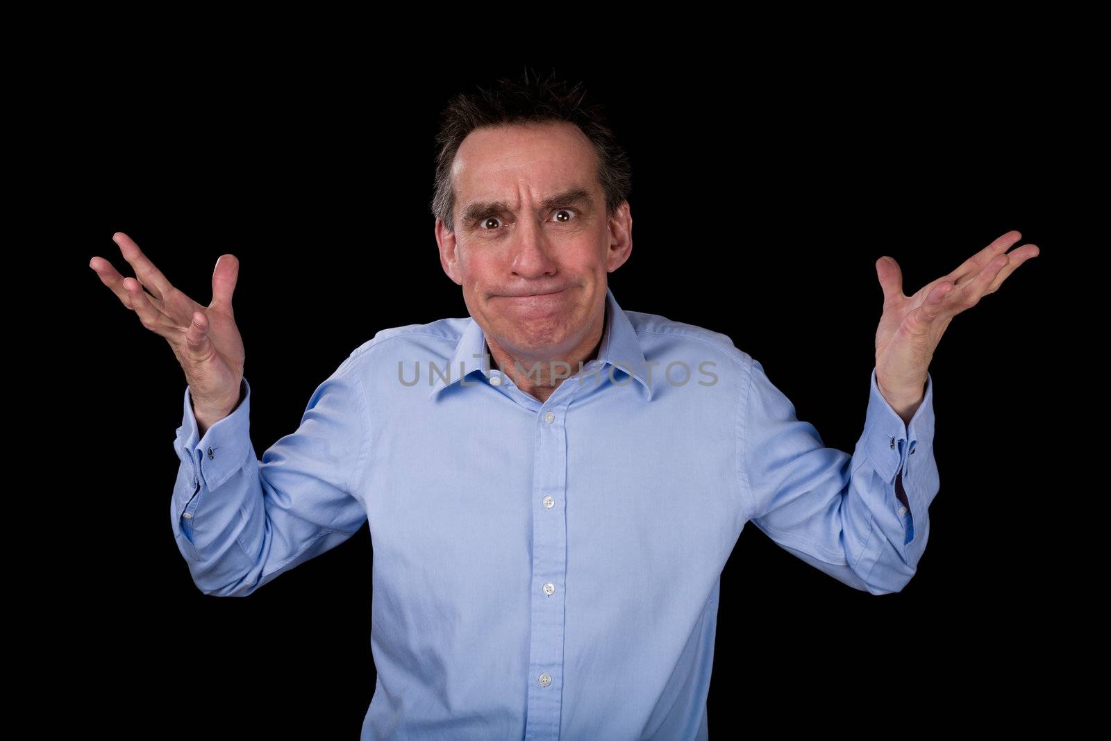 Angry Middle Age Business Man Hands Raised in Frustration Black Background