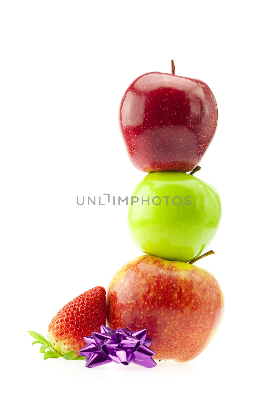 apples, strawberries and bow isolated on white by jannyjus