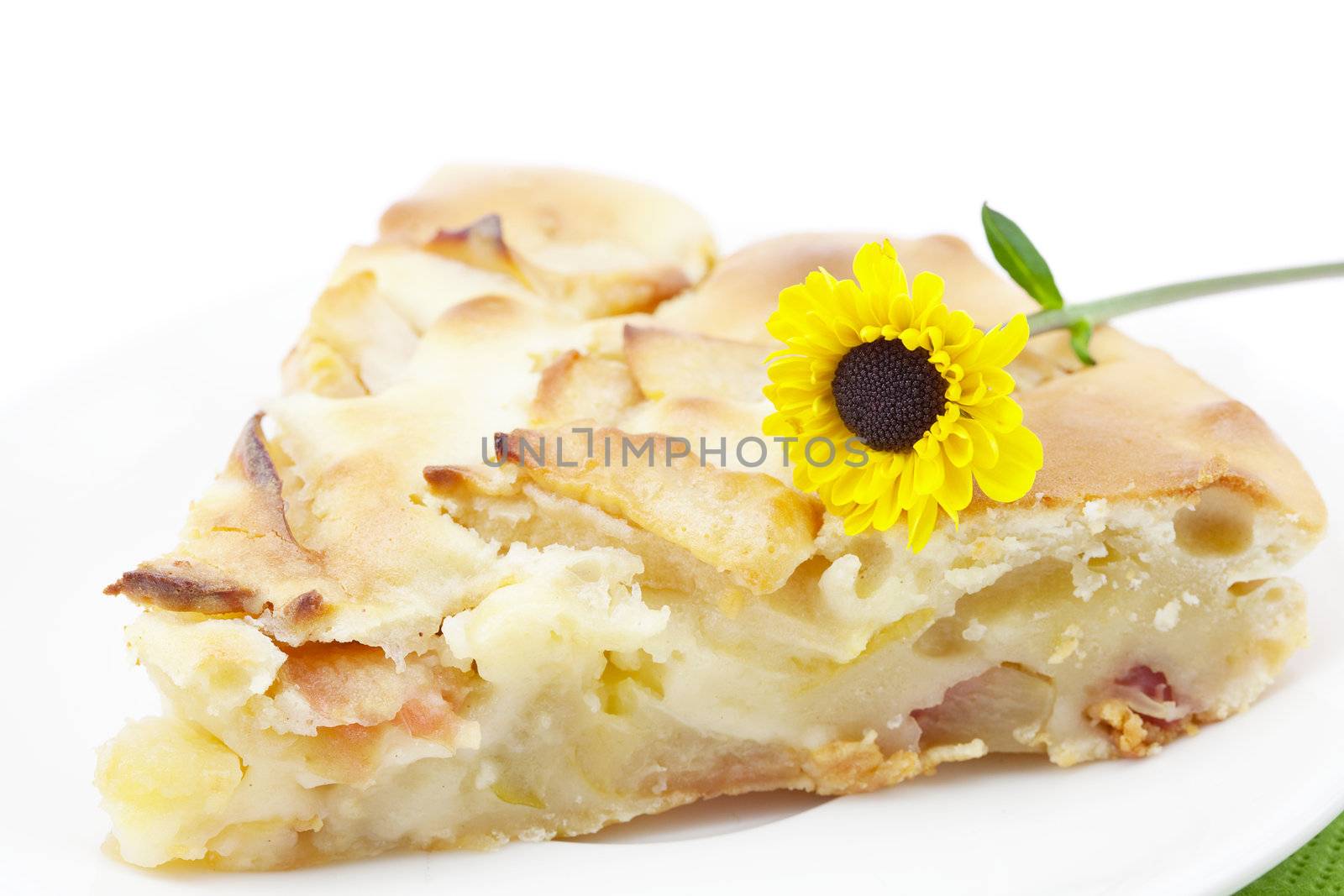 apple pie and a flower isolated on white