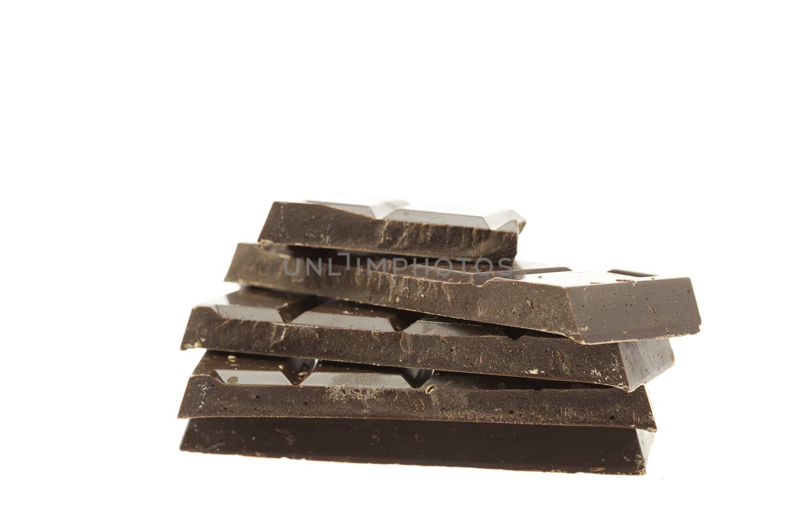 Mount a piece of chocolate isolated on white