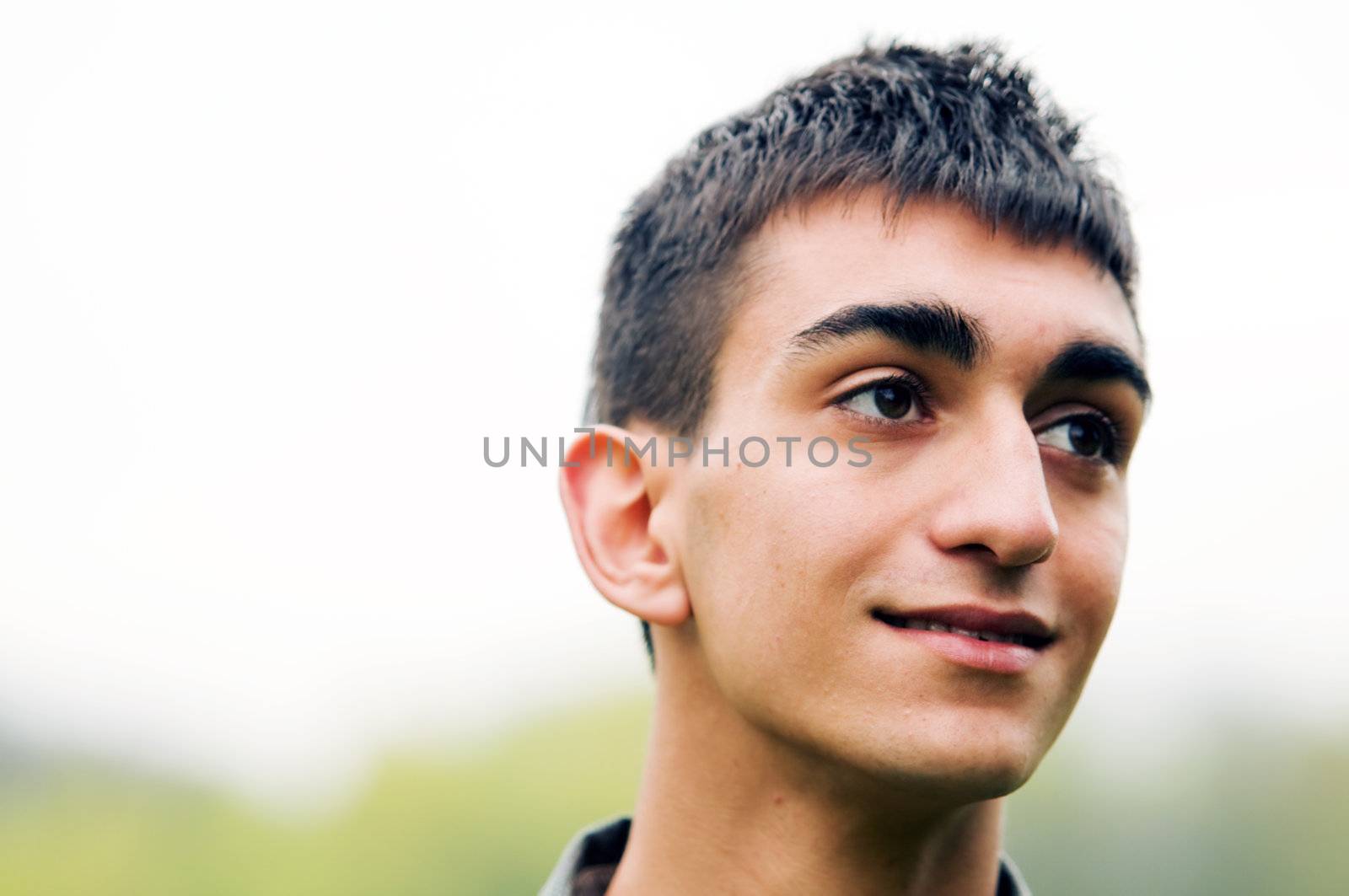 Young happy man by photocreo