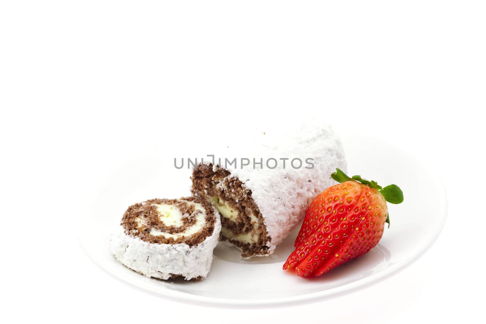 strawberries and roll on a plate isolated on white