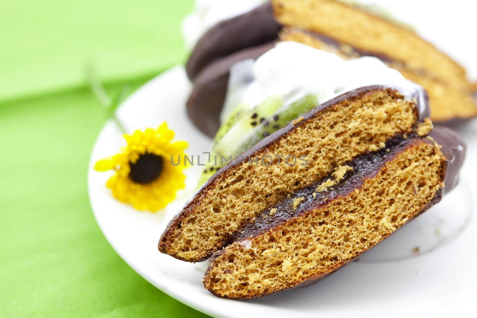 cake on a plate with a flower