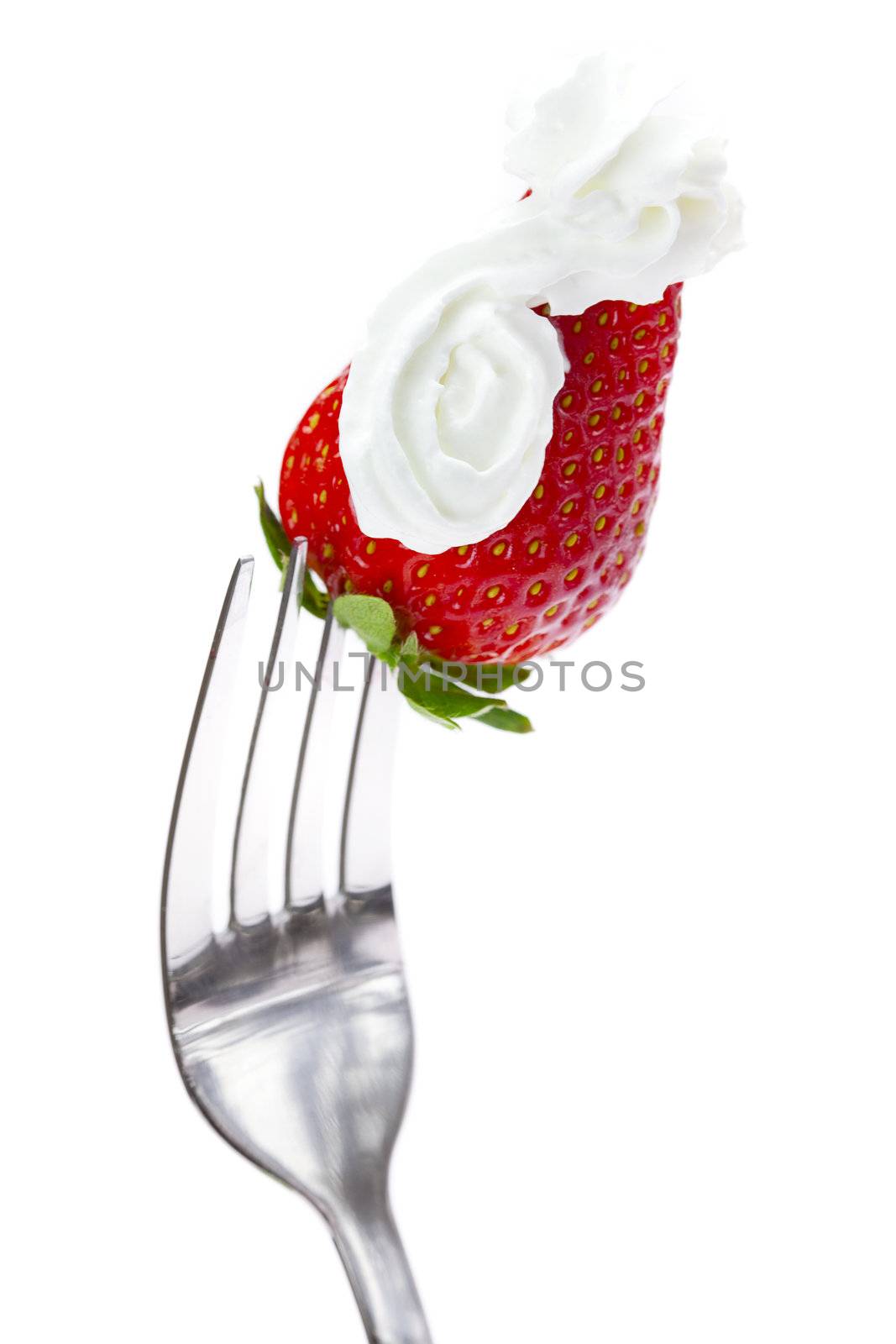 strawberries with cream on a fork isolated on white by jannyjus
