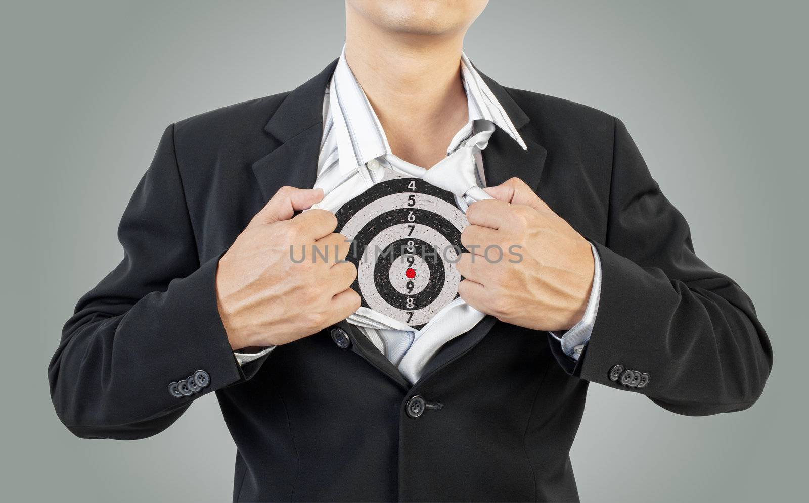 businessman showing target under shirt