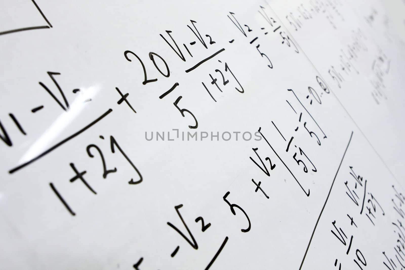 formulas on a whiteboard 