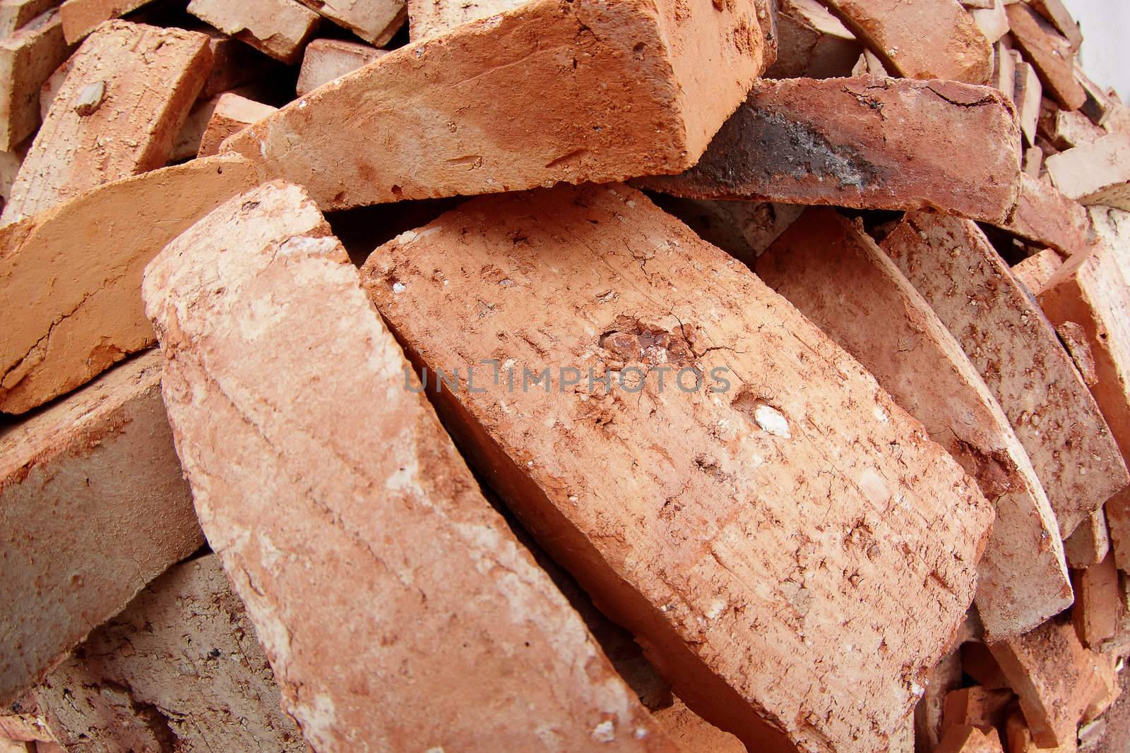 heap of red brick at day 