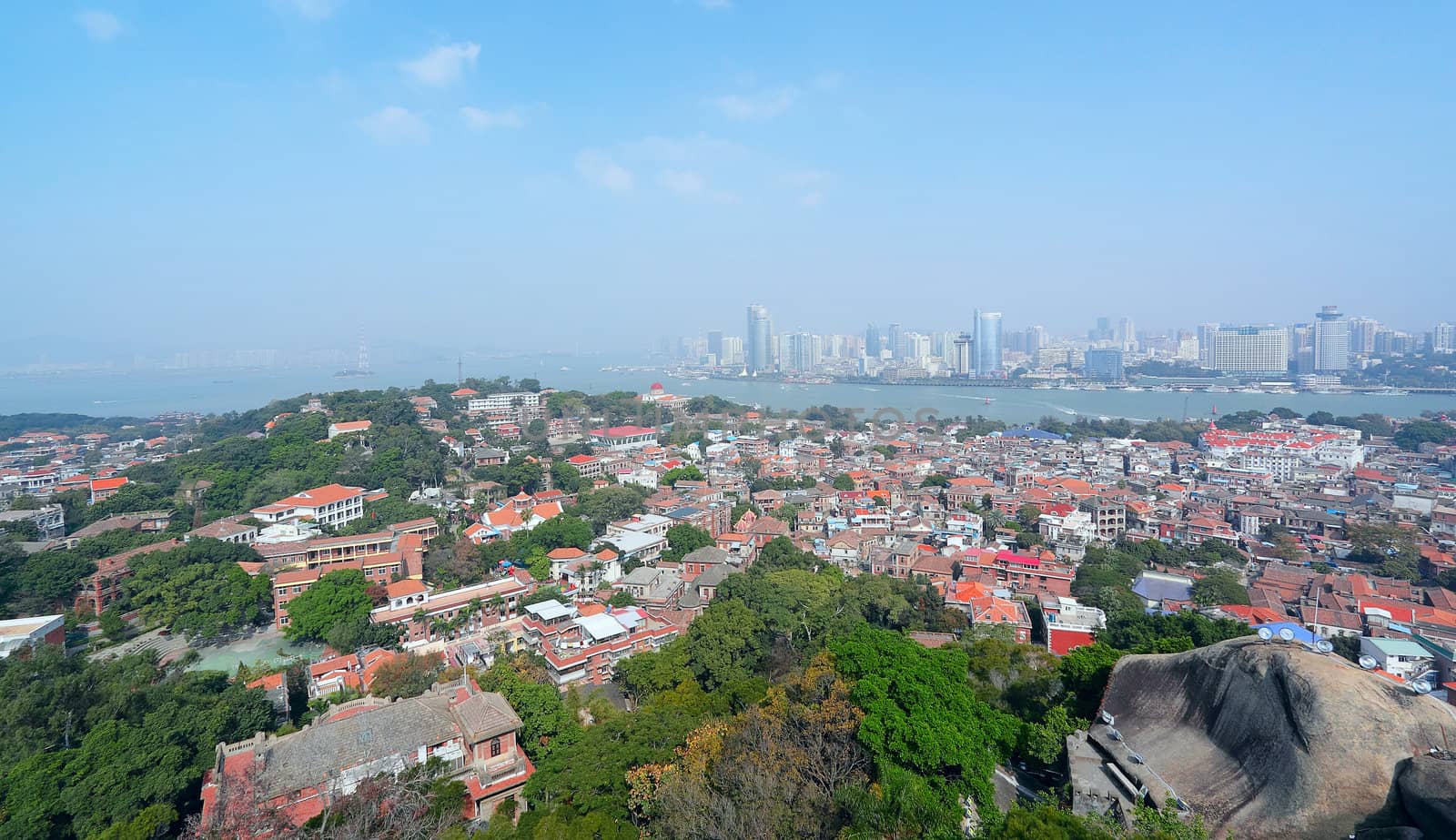 Aerial image of a modern city by a river 