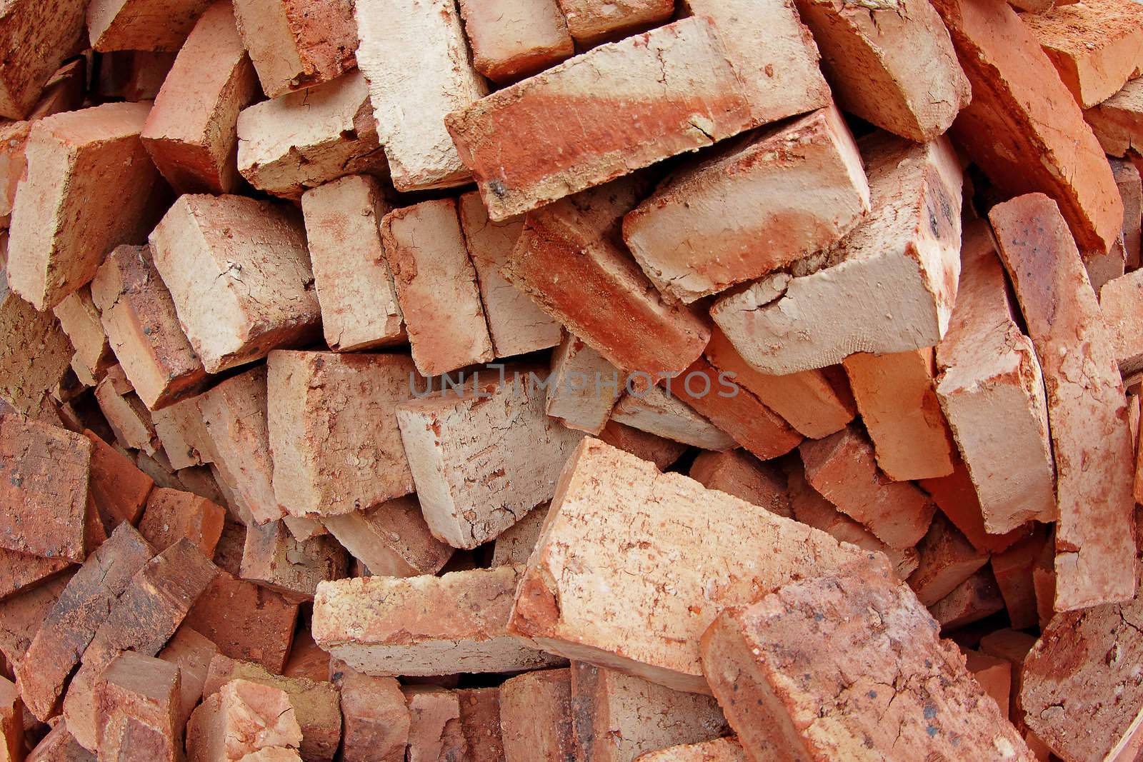 heap of red brick at day 