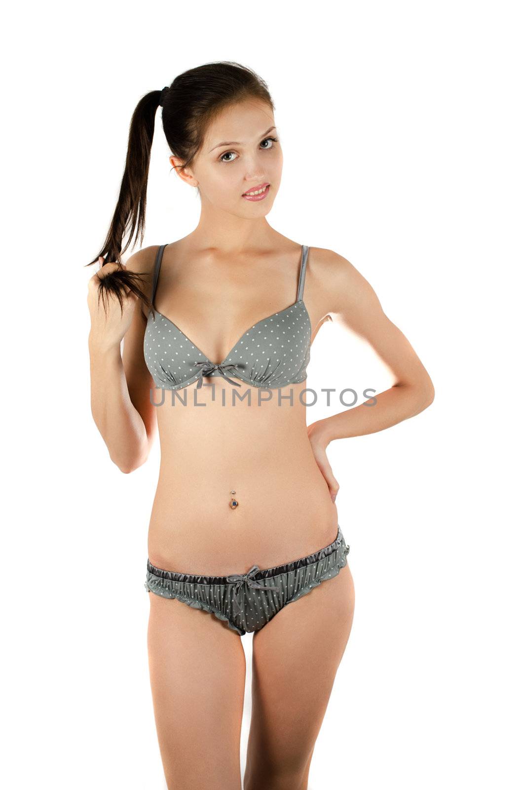 Beautiful girl in a underwear on a white