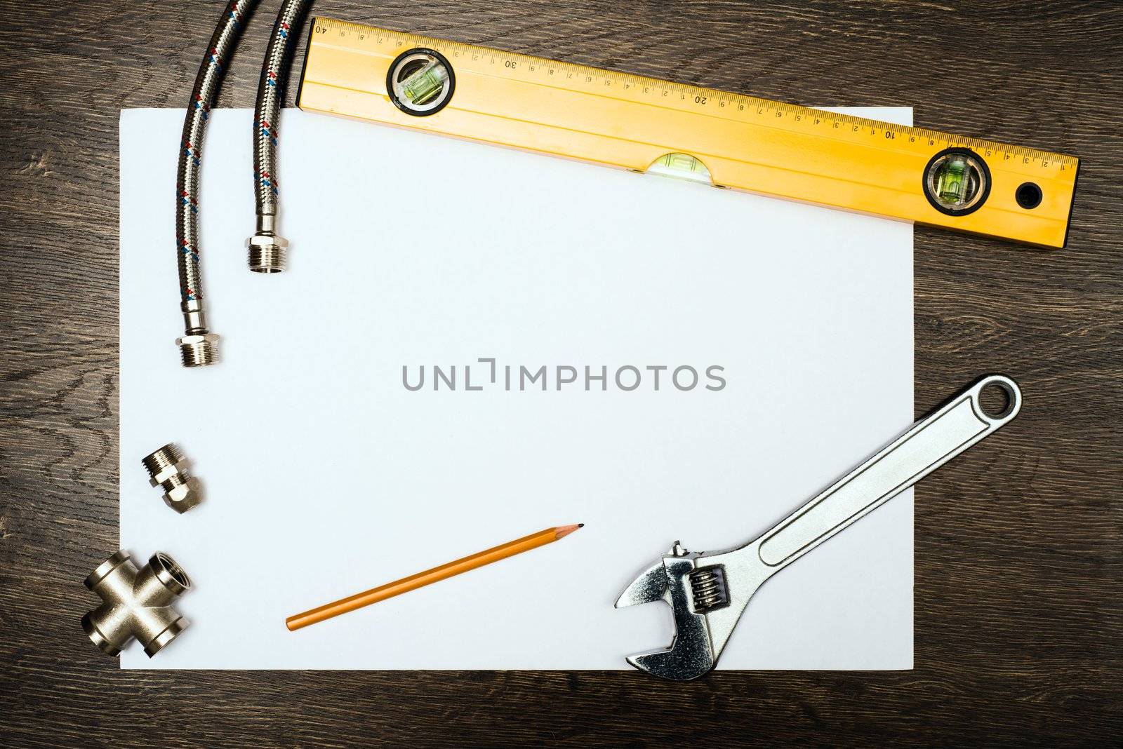 plumbing tools on a white sheet of paper by adam121