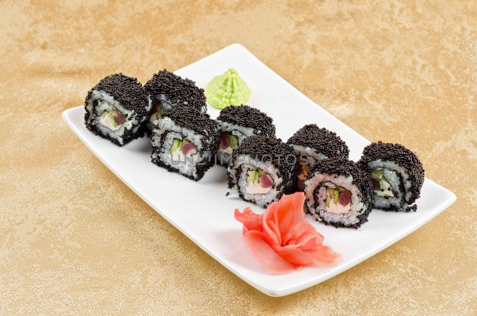 sushi roll with tuna, avacado, sauce and flying fish roe