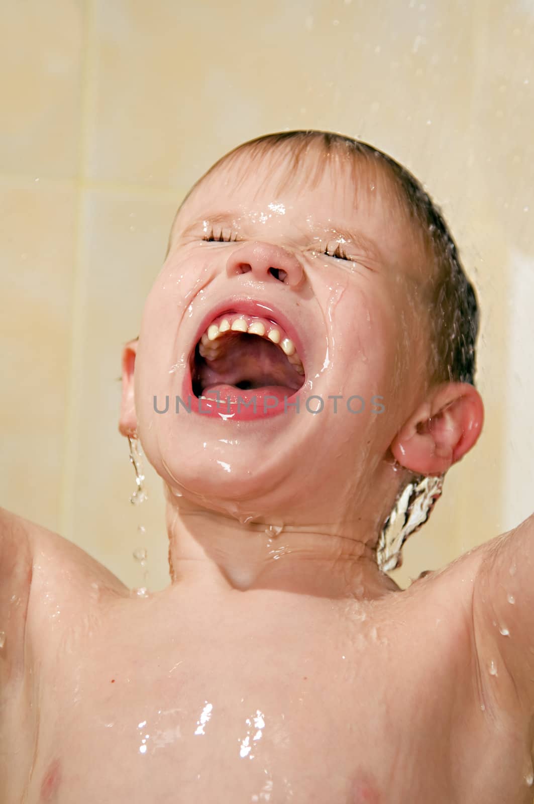 happy child wash in the shower
