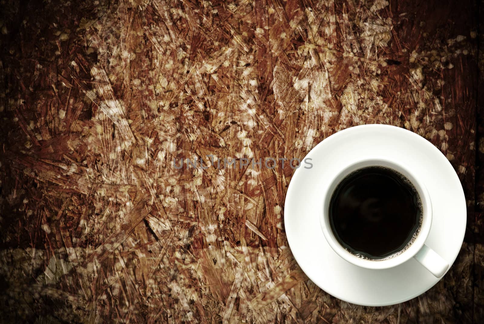 Coffee cup on grunge wood table, Retro concept