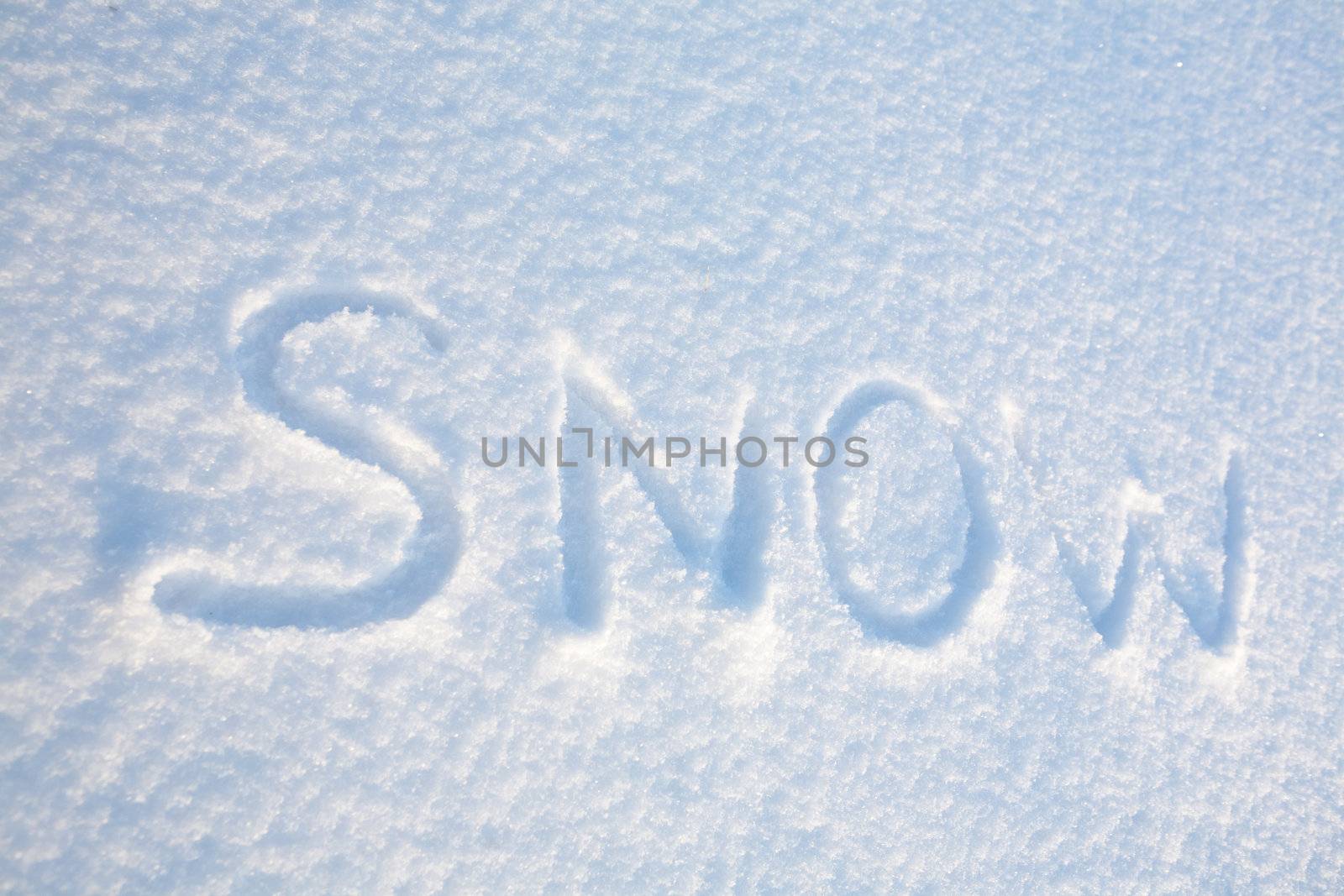 inscription snow on the white snow