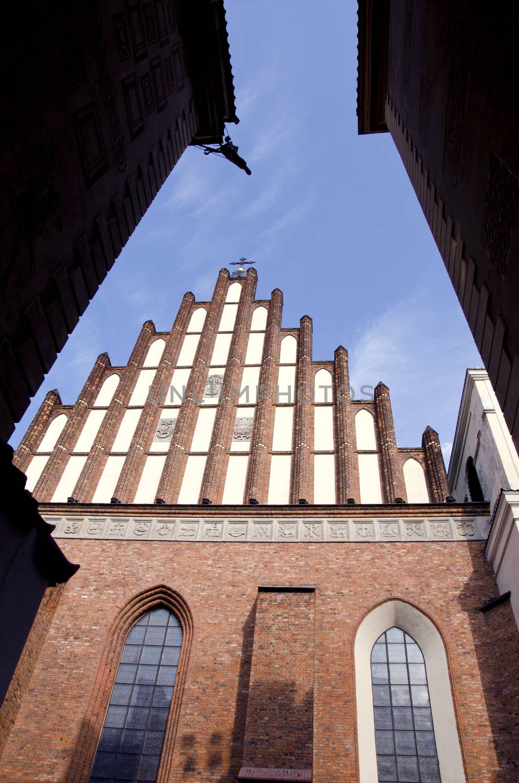 old town street with church in Warsaw, Poland