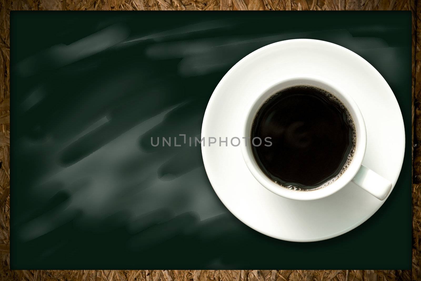 Coffee cup on blackboard background