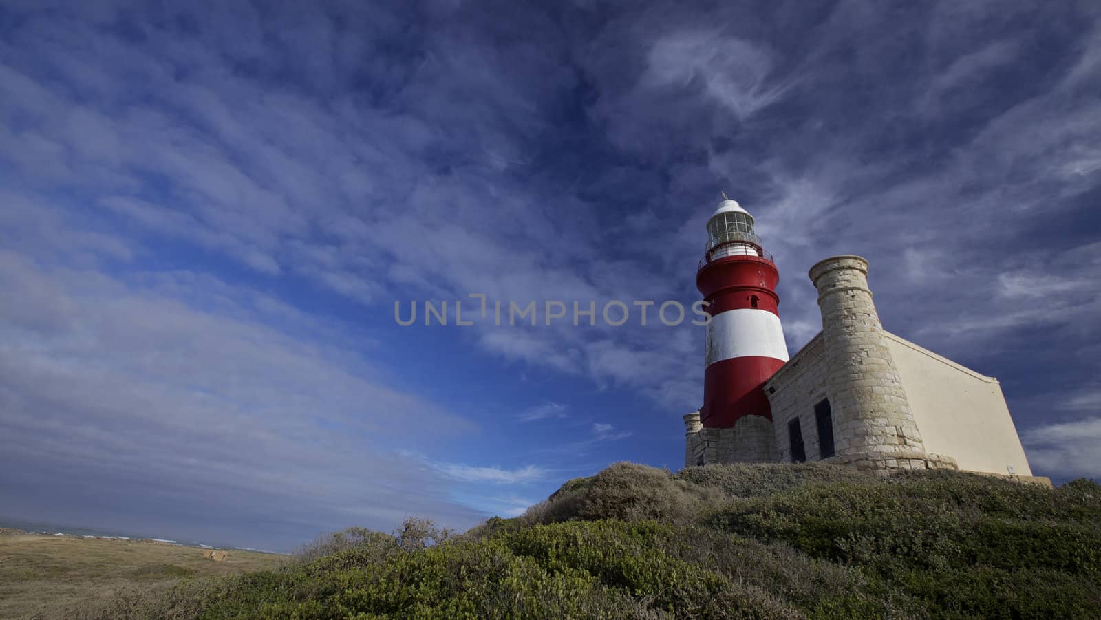 Lighthouse ( Cape Agulhas 1848 in South Africa )  by instinia