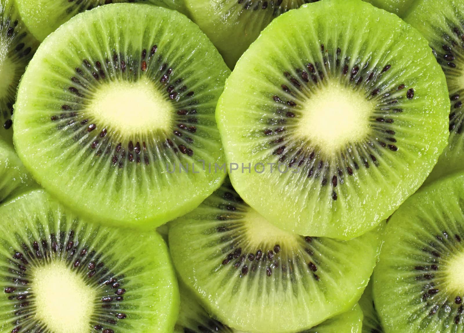 Fresh kiwi as a background