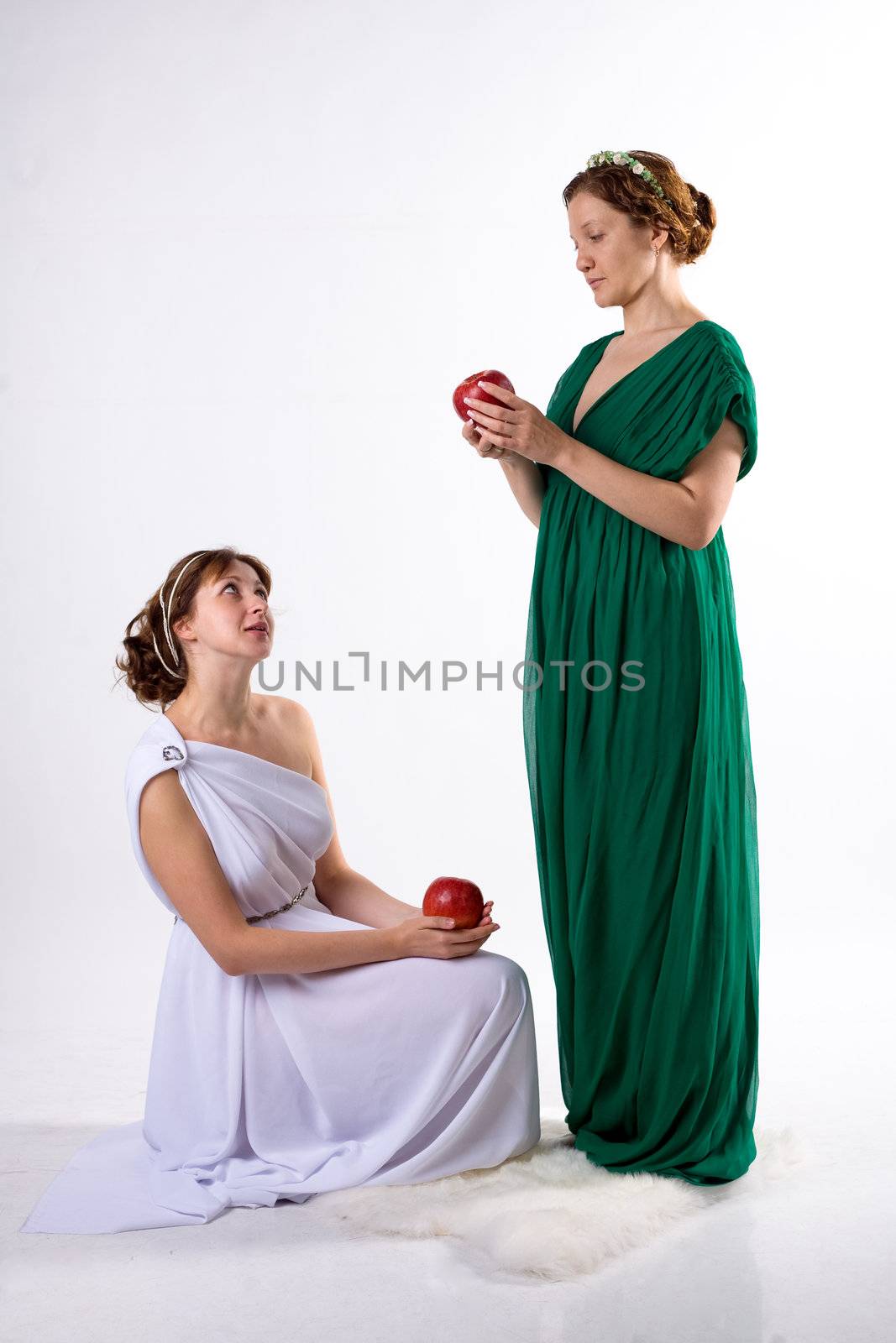 Two ladies and two apples by foaloce