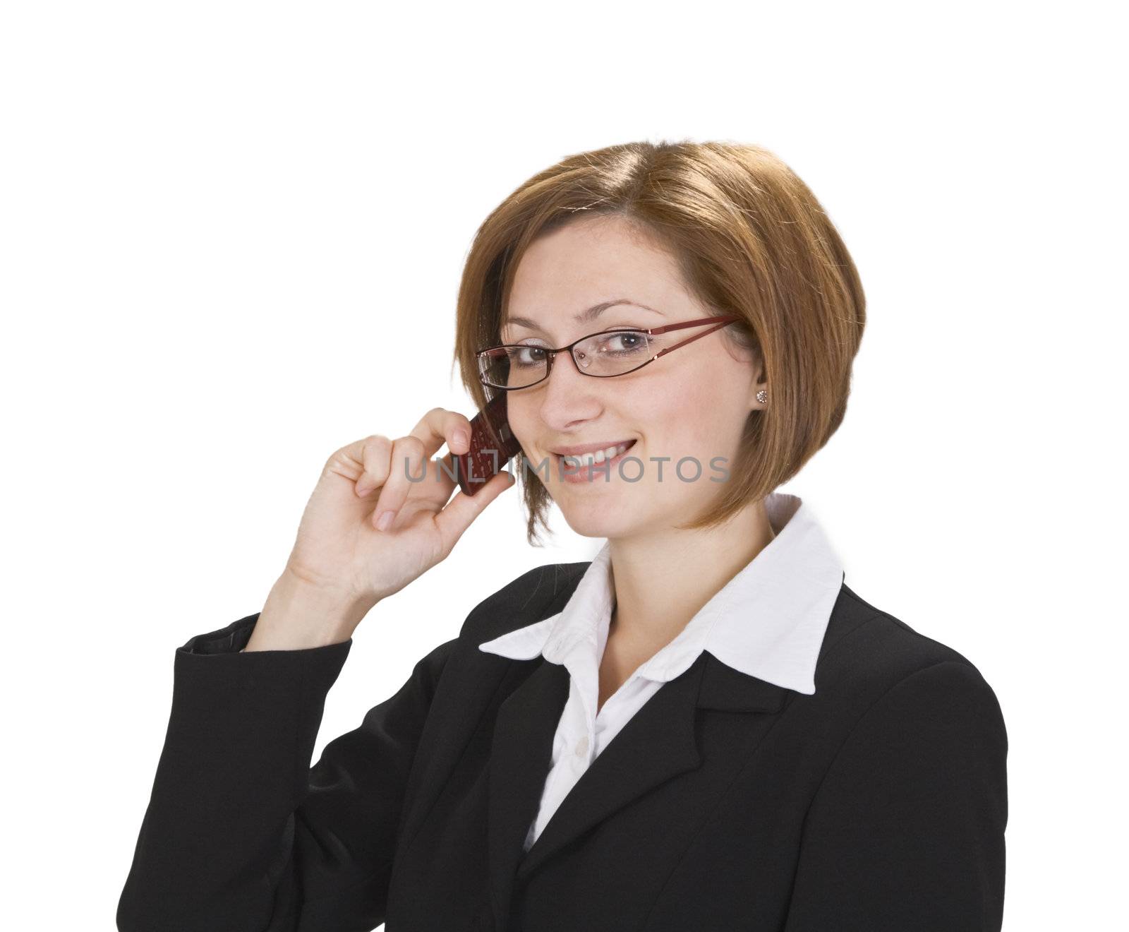 Smilling businesswoman with glasses using a mobile phone.