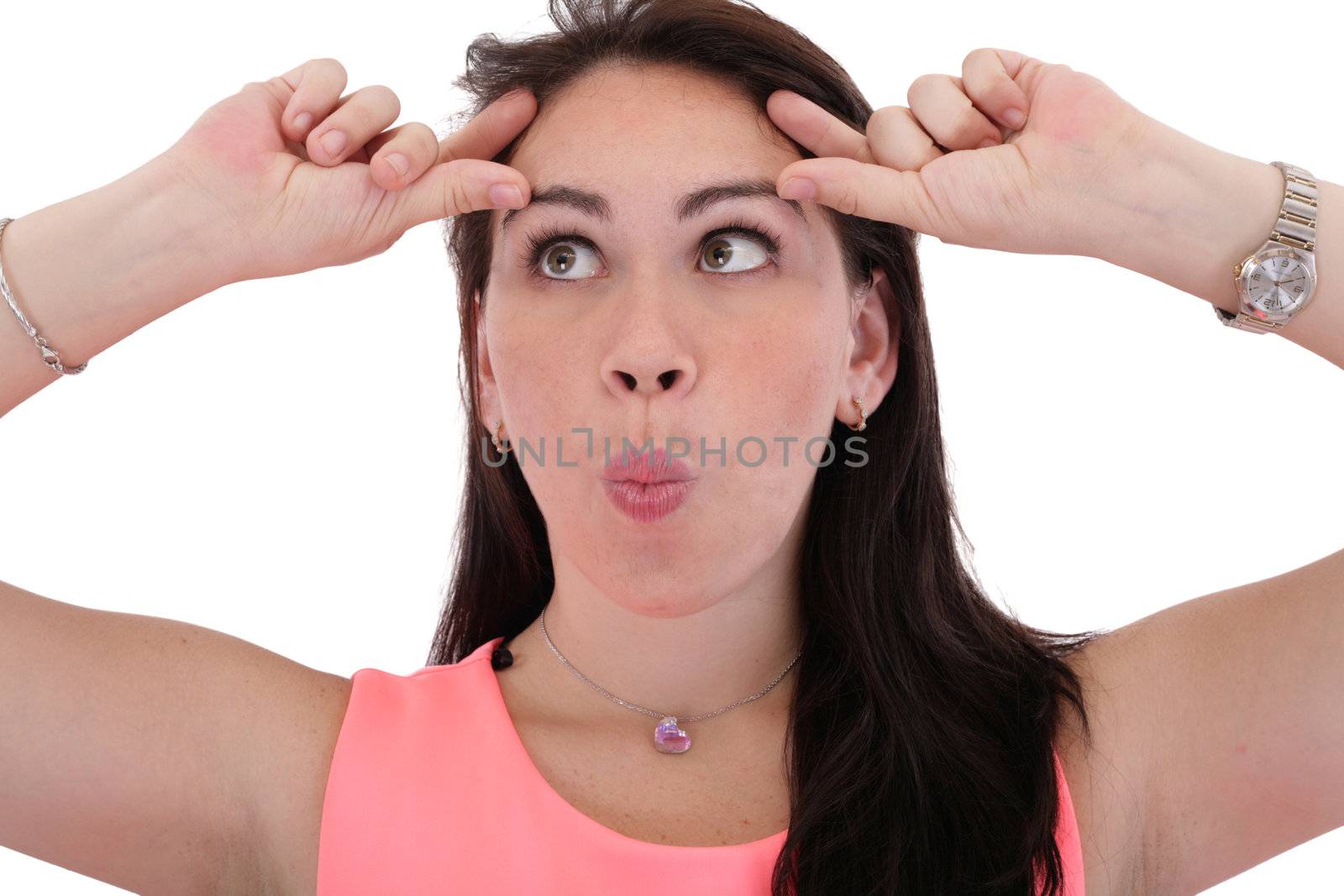 Portrait of a funny young woman looking up on isolated background