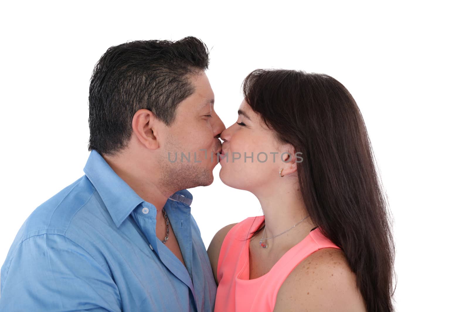Isolated young casual couple kissing by dacasdo