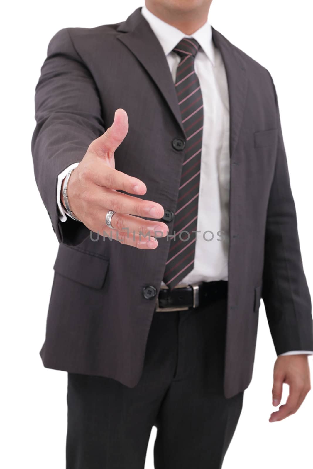 Business man with hand extended to handshake - isolated over white
