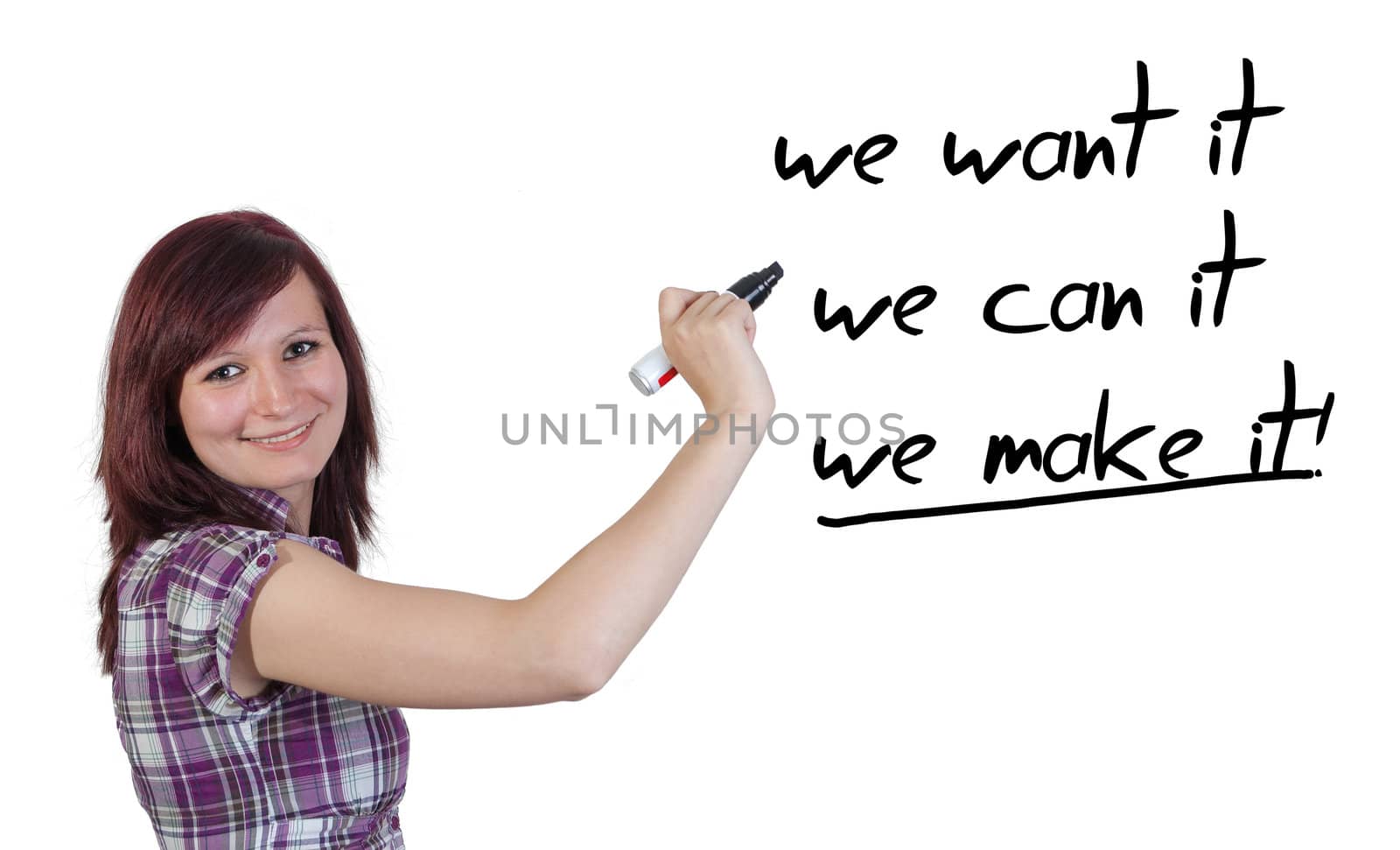 Businesswoman drawing an motivation concept on a whiteboard