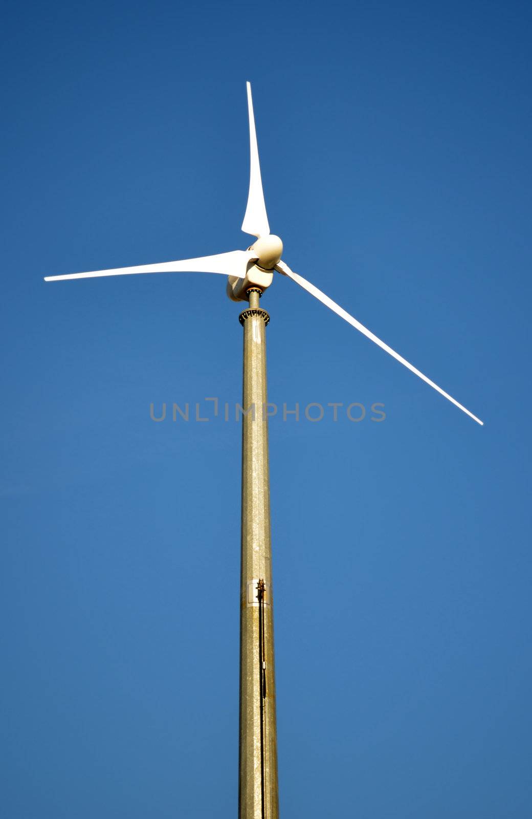 Wind turbine and blue sky by artofphoto